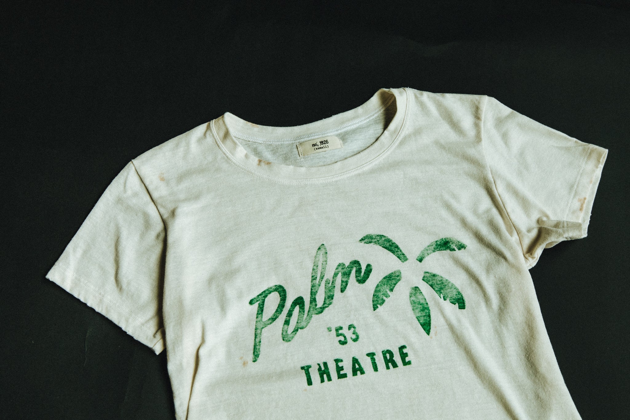 the "palm theatre" tee Tee Number 1926   